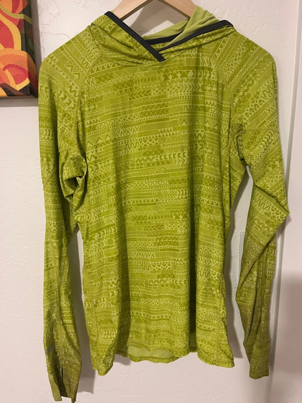 NRS woman’s sun hoodie green geometric pattern